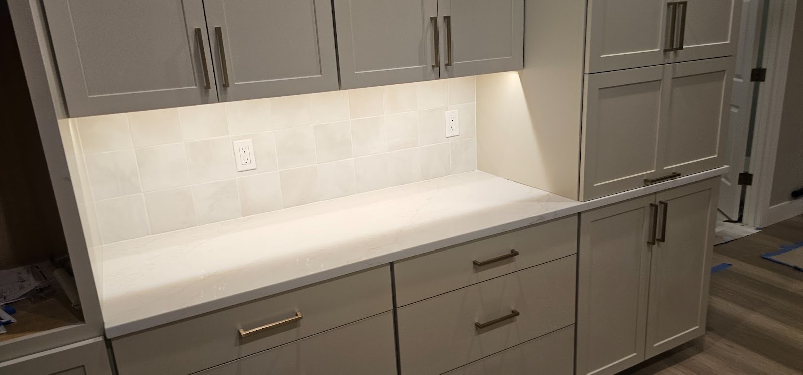 Kitchen remodel wiring in Vancouver, WA: under-cabinet lighting and new backsplash receptacles installed by Brightwise Electric